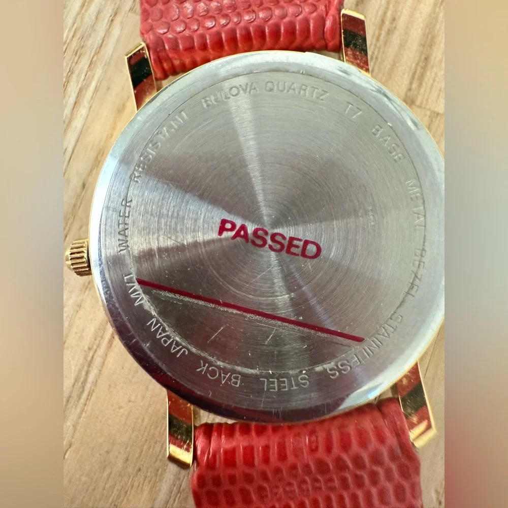 Bulova gold tone red leather watch NEW BATTERY